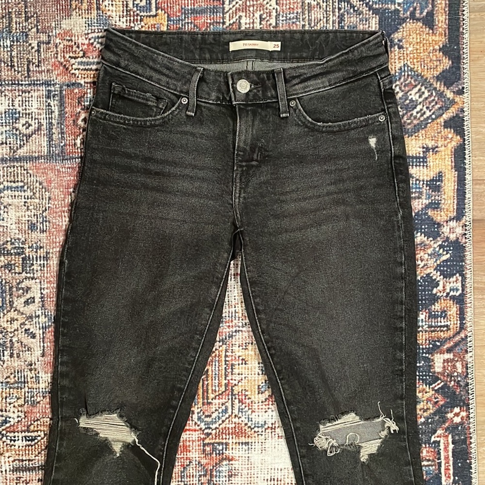 711 ripped skinny jeans